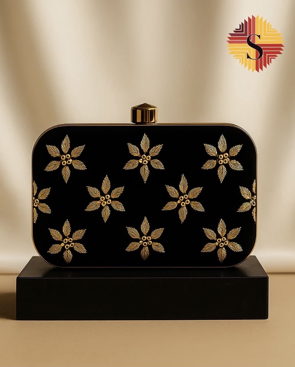 Gold-embroidered evening clutch